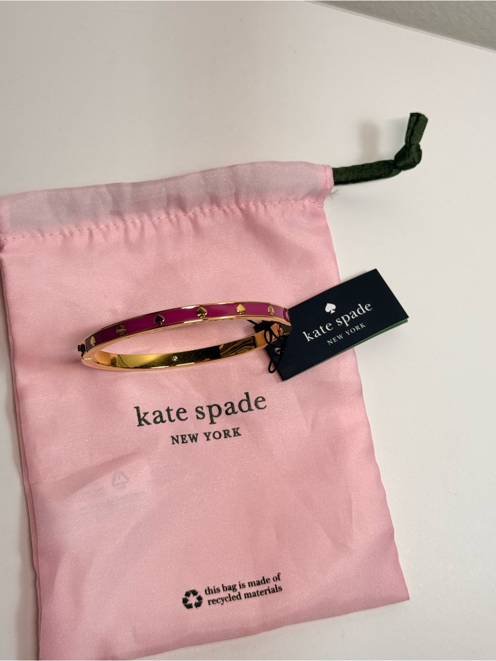 Kate Spade New York gold & pink bangle bracelet
